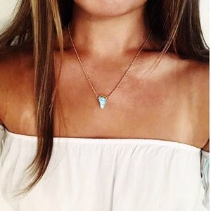 Wire-wrapped teal crystal